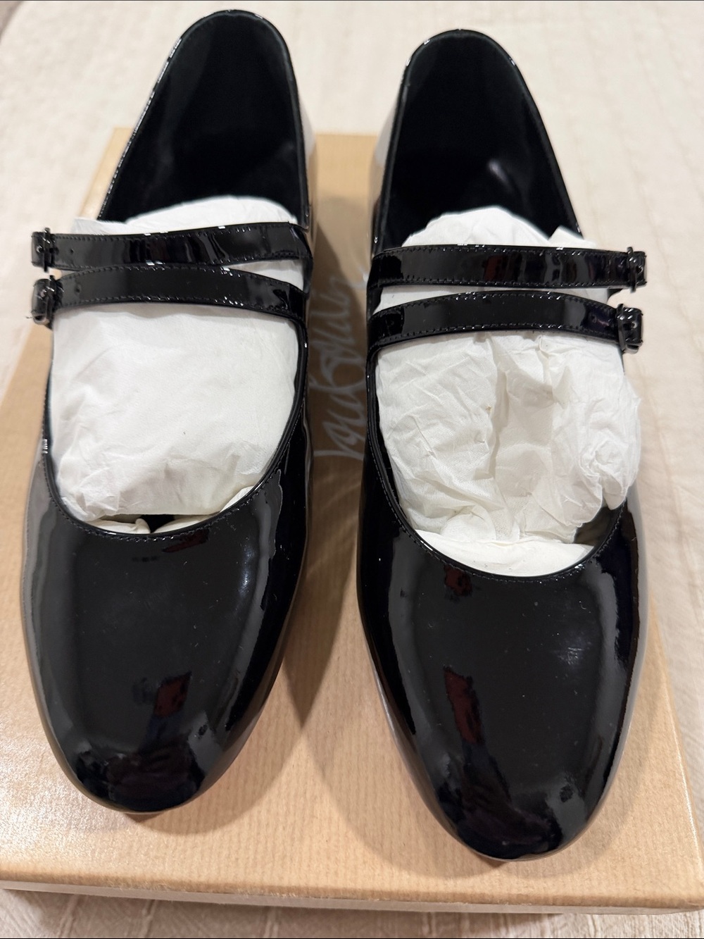 Christian Louboutin
Classic Black Patent Mary Jane Flats